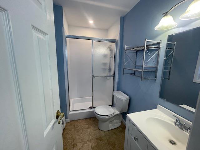 Undisclosed Address Stony Brook, NY 11790 - Photo 8 of 26 a bathroom with a toilet and a sink
