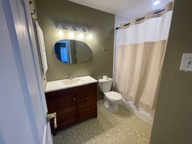 Undisclosed Address Stony Brook, NY 11790 - Photo 10 of 26 a bathroom with a sink vanity toilet and shower