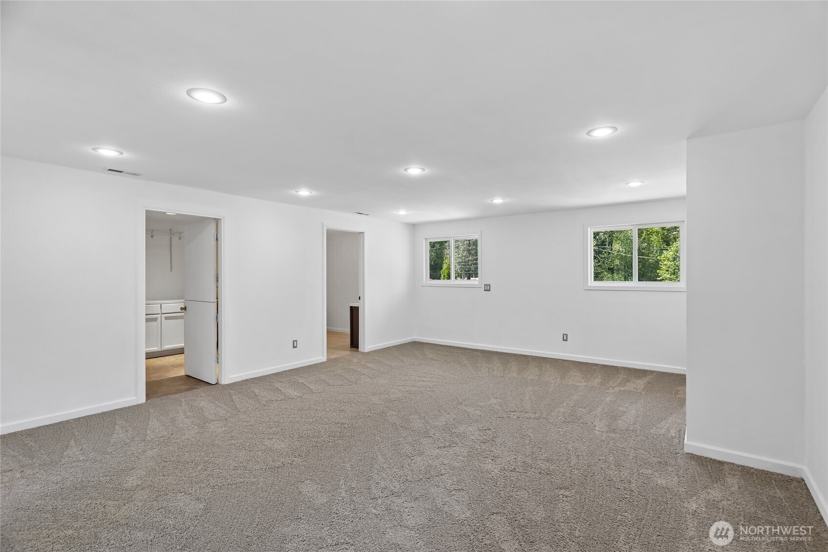 28601 Southeast 225th Street Maple Valley, WA 98038 - Photo 23 of 40 an empty room with windows