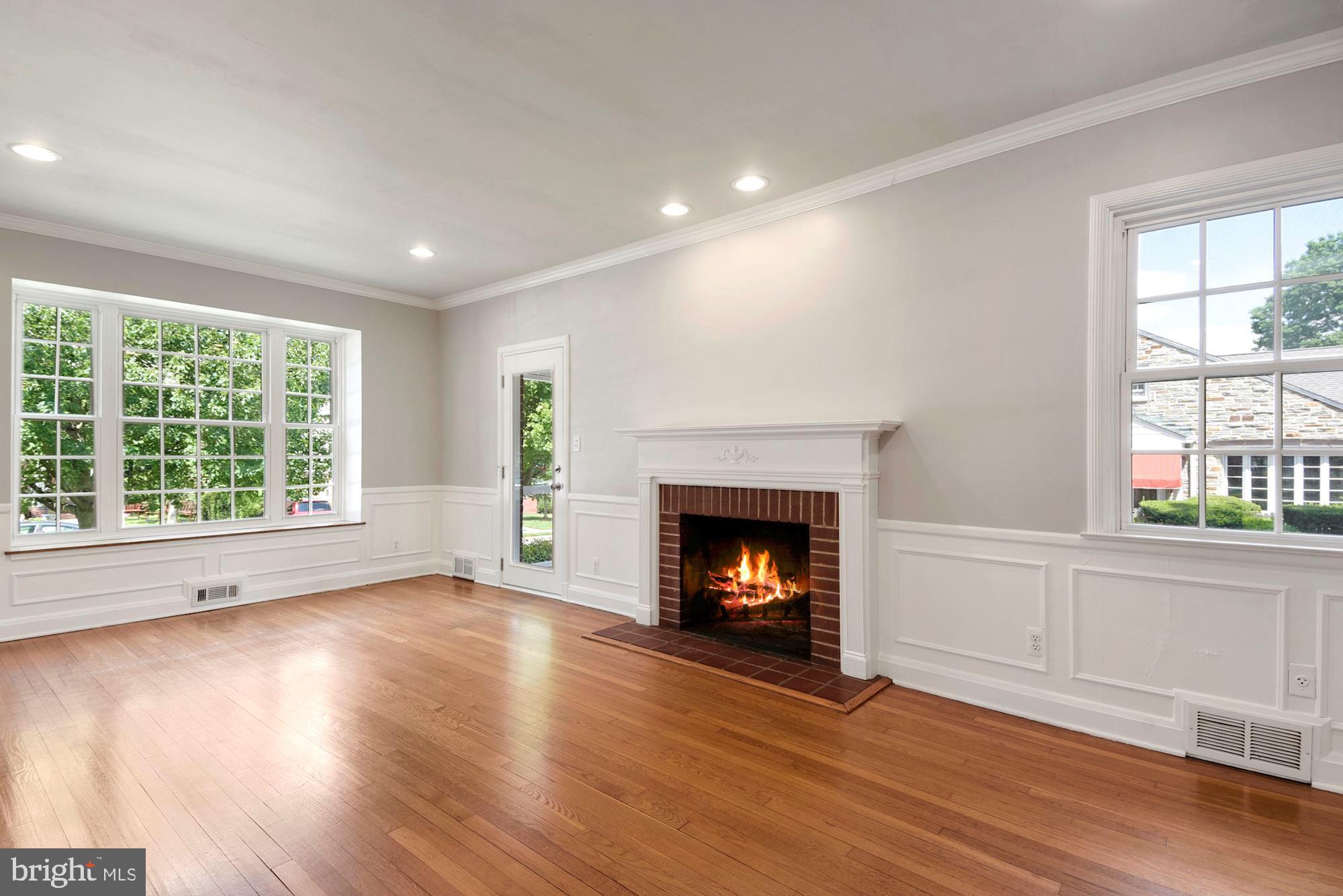 527 Yarmouth Road Towson, MD 21286 - Photo 10 of 61 Living room with fireplace big bay window with win