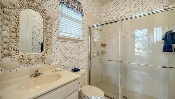 an aerial view of a house with a swimming pool yard and outdoor seating