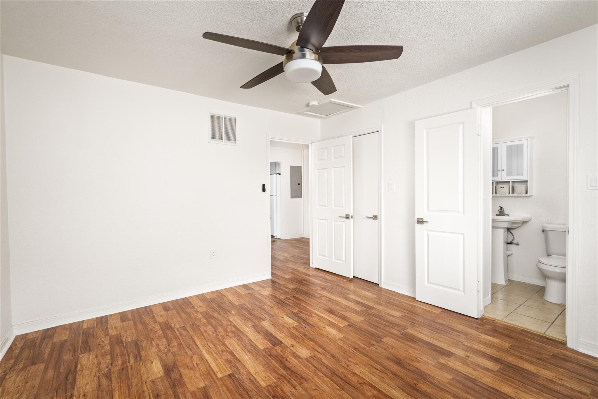 3910 Dallas Street, Unit 3 Houston, TX 77023 - Photo 3 of 8 a view of empty room with wooden floor