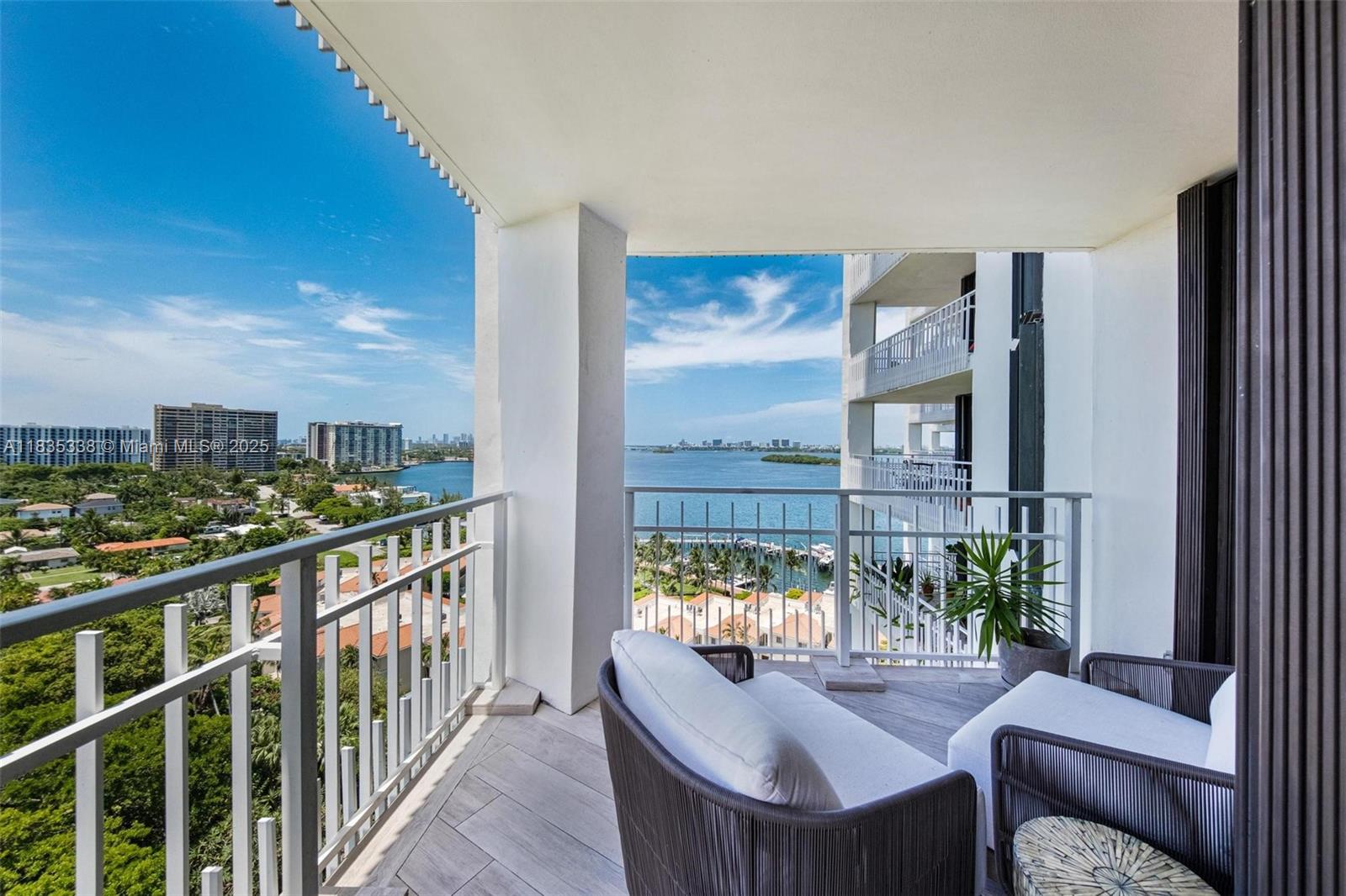 4000 Towerside Terrace, Unit 1507 Miami, FL 33138 - Photo 19 of 86 a dining room with furniture a rug and a floor to ceiling window