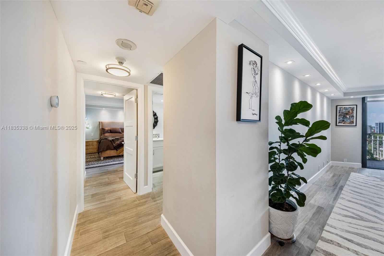 4000 Towerside Terrace, Unit 1507 Miami, FL 33138 - Photo 25 of 86 a view of a hallway and interior of a house