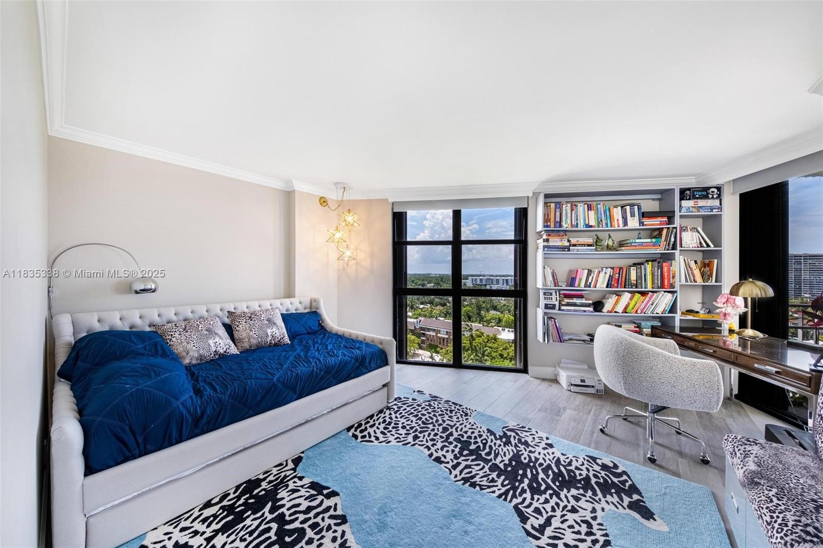 4000 Towerside Terrace, Unit 1507 Miami, FL 33138 - Photo 28 of 86 a living room with furniture and a flat screen tv