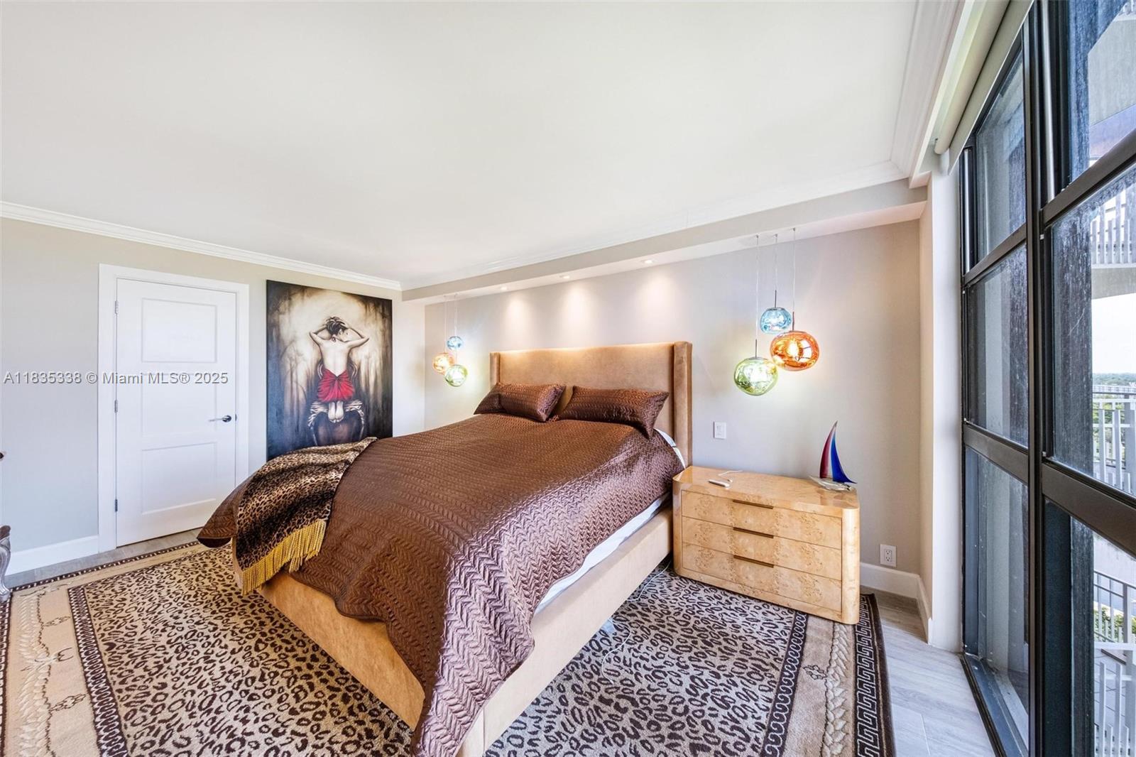 4000 Towerside Terrace, Unit 1507 Miami, FL 33138 - Photo 36 of 86 a bedroom with a bed and a dresser