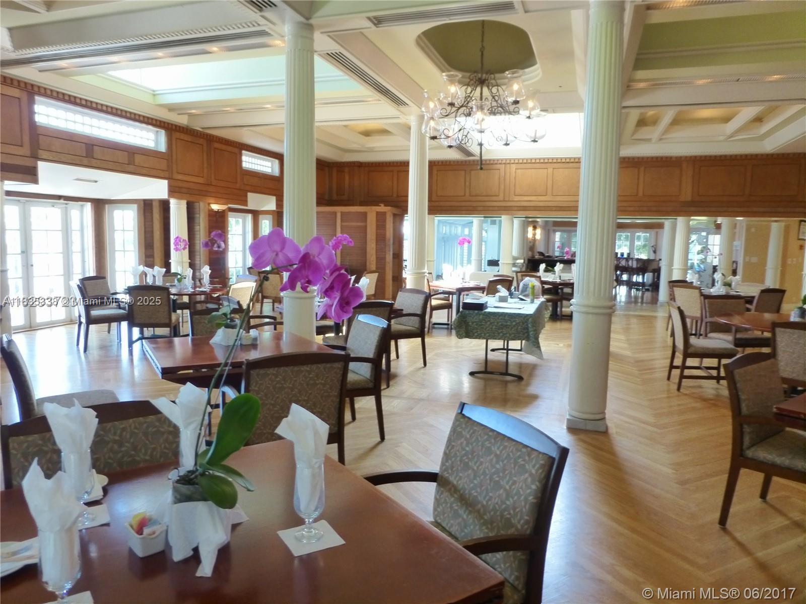 4000 Towerside Terrace, Unit 1507 Miami, FL 33138 - Photo 73 of 86 a living room filled with furniture and floor to ceiling windows