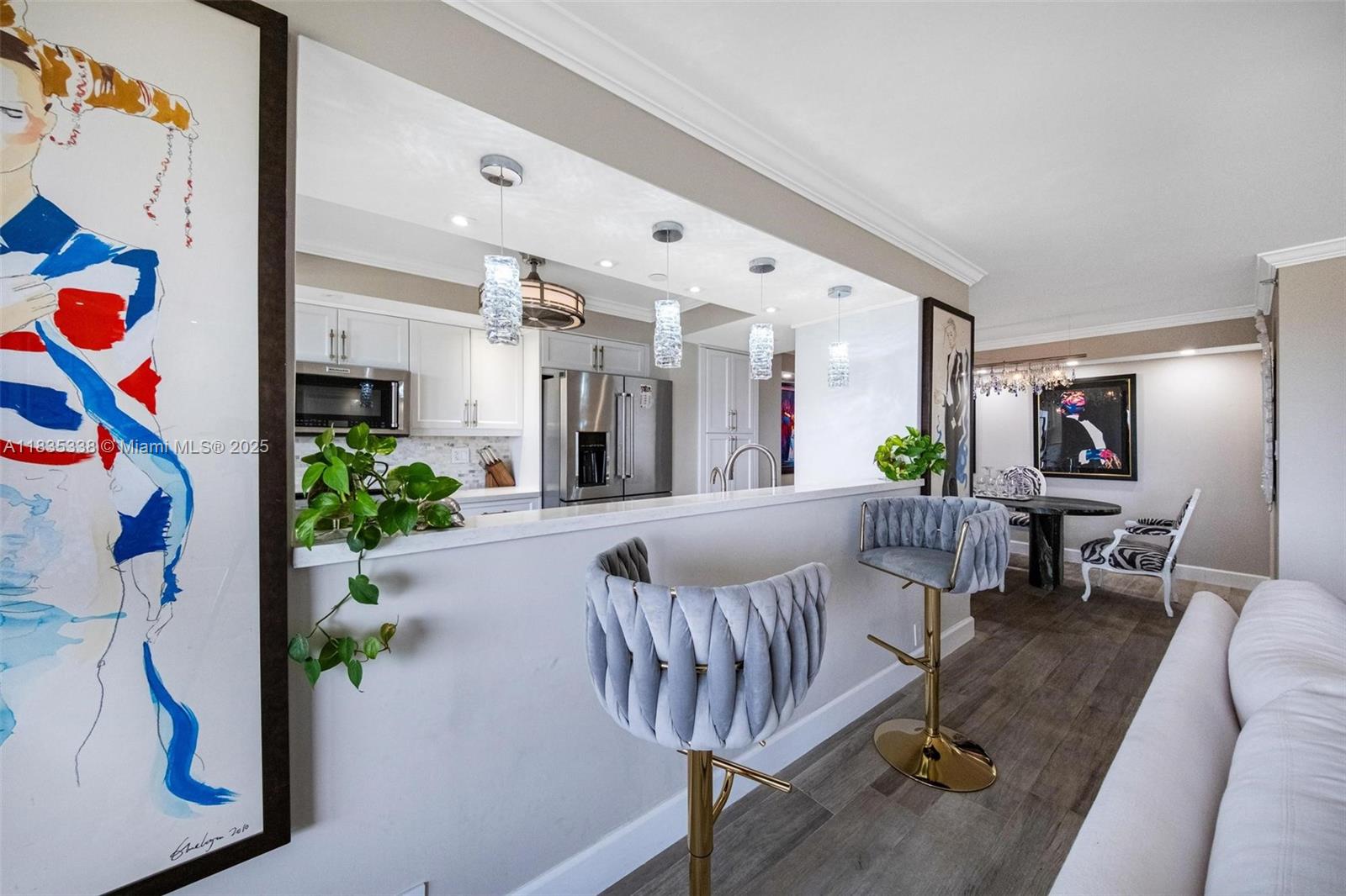 4000 Towerside Terrace, Unit 1507 Miami, FL 33138 - Photo 8 of 86 a living room with furniture and a fireplace