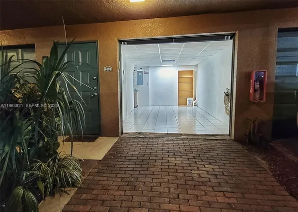 a bathroom with a shower and a tub