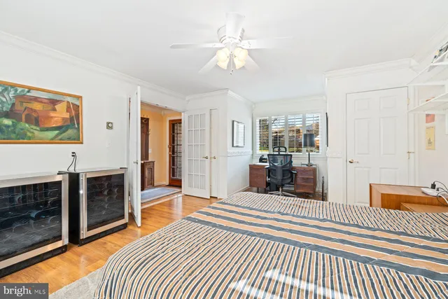 a bedroom with furniture and a fireplace