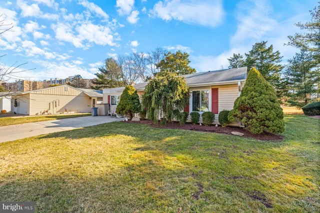 a view of an house with swimming pool and porch