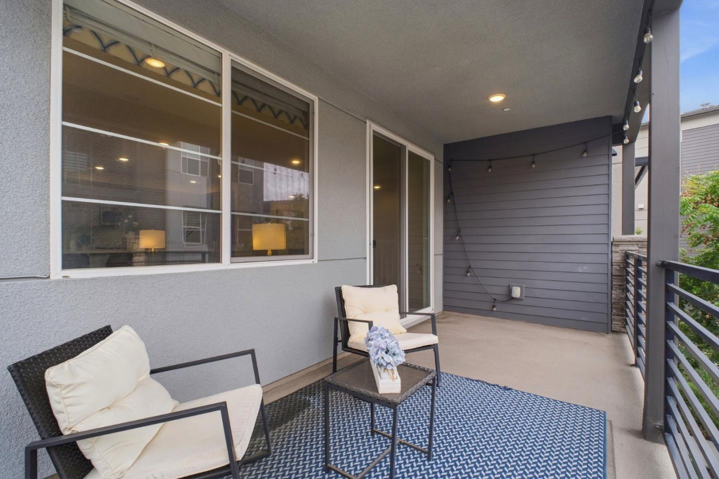 385 Line Street Hayward, CA 94544 - Photo 27 of 38 a backyard of a house with table and chairs