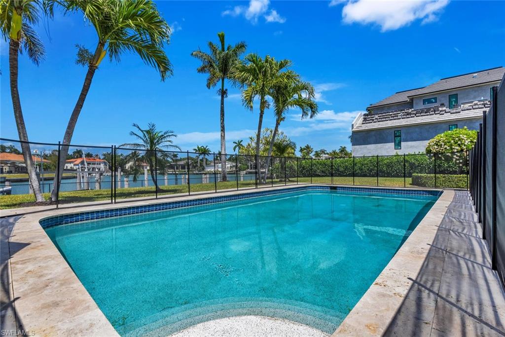 367 Mooring Line Drive Naples, FL 34102 - Photo 38 of 44 a view of swimming pool with a yard