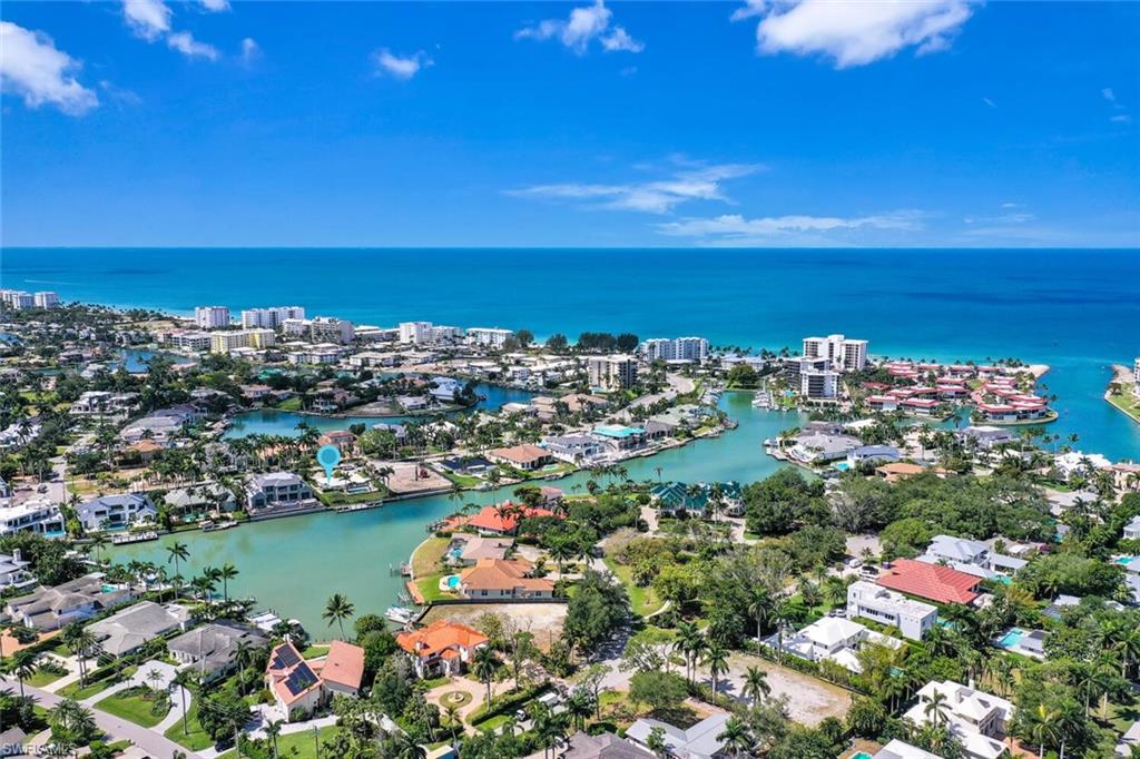 367 Mooring Line Drive Naples, FL 34102 - Photo 40 of 44 a view of a city with ocean view