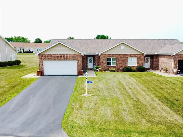 a house view with a garden space