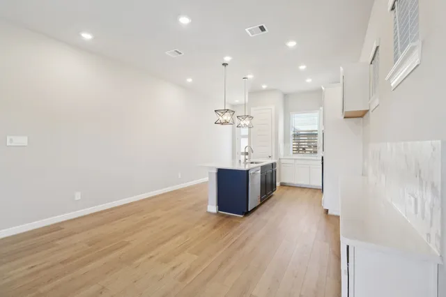 a view of kitchen with wooden floor