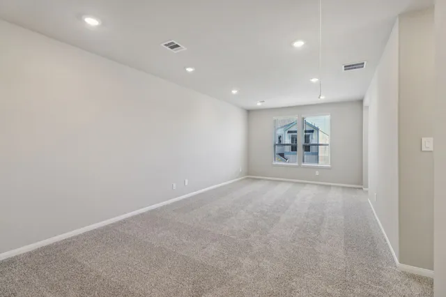 en empty room with windows