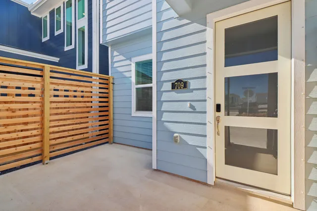 a view of a house with a door and a window