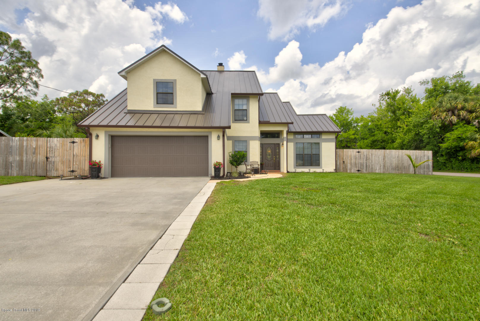 6300 Janina Road Cocoa, FL 32927 - Photo 1 of 74 front of house