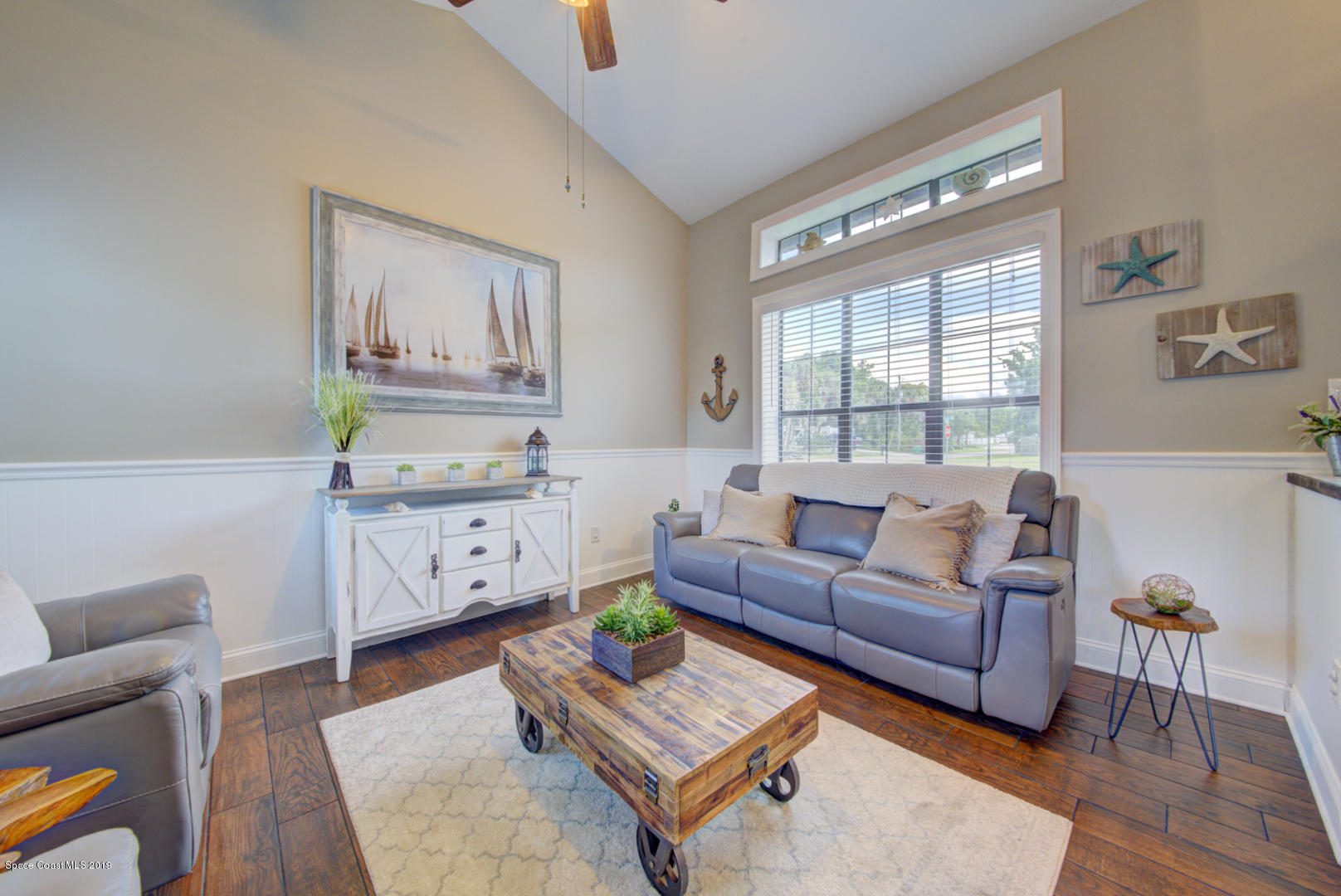 6300 Janina Road Cocoa, FL 32927 - Photo 12 of 74 living room with wood-look tile floor