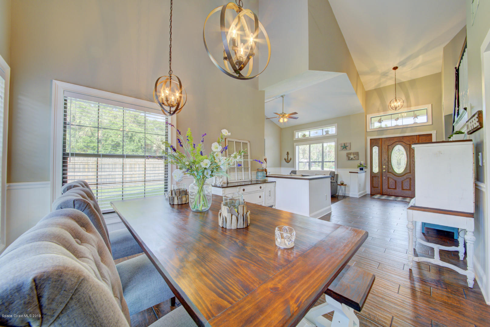 6300 Janina Road Cocoa, FL 32927 - Photo 18 of 74 dining room open to living room & foyer