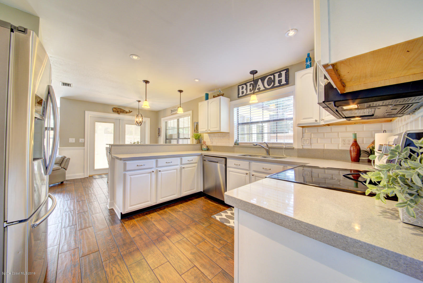 6300 Janina Road Cocoa, FL 32927 - Photo 20 of 74 kitchen with wood-look tile floor