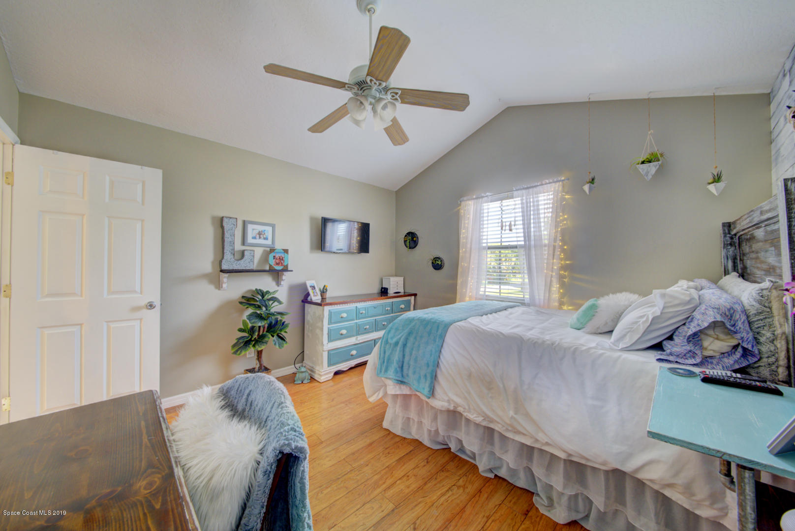 6300 Janina Road Cocoa, FL 32927 - Photo 34 of 74 bedroom 3 with vaulted ceiling