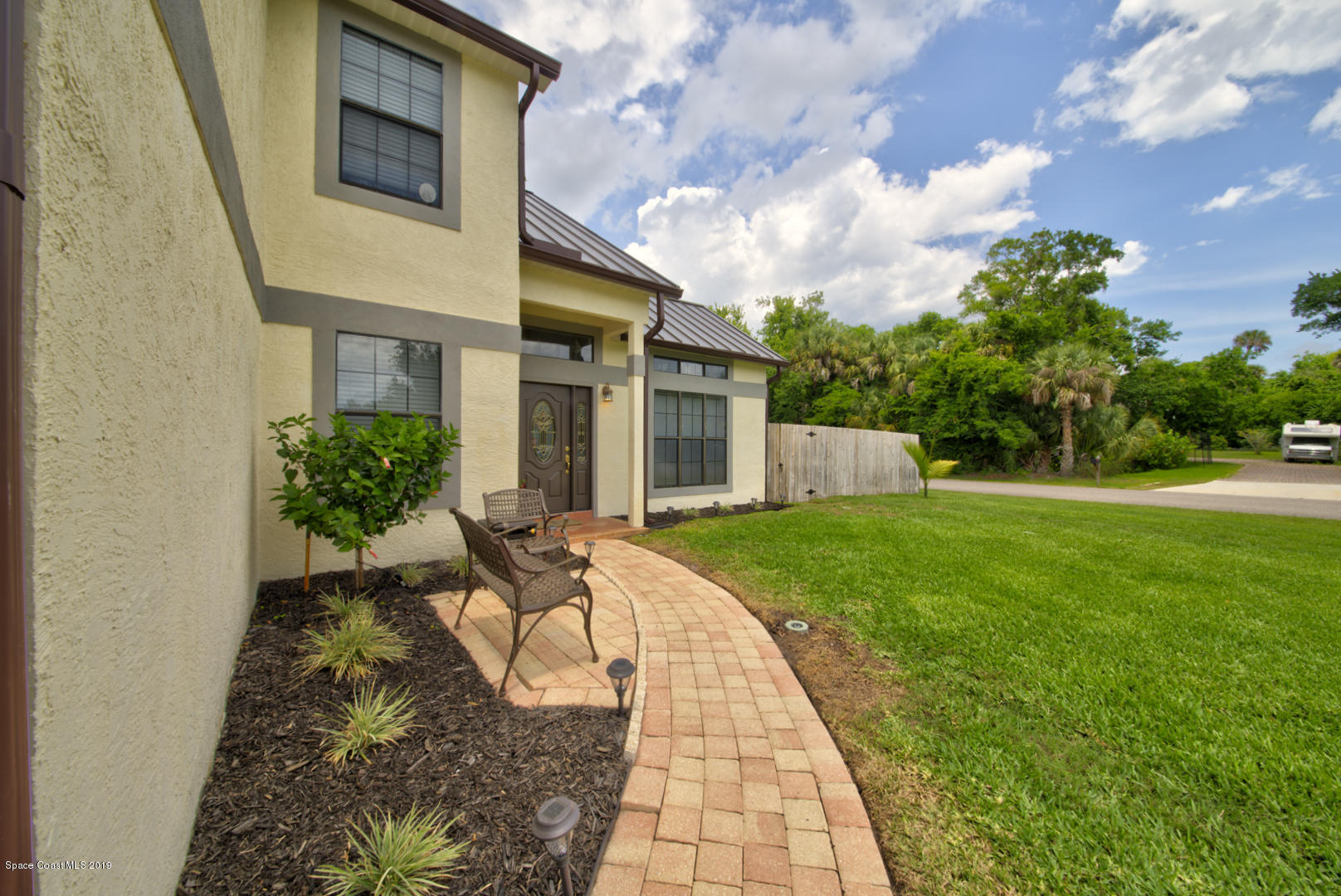 6300 Janina Road Cocoa, FL 32927 - Photo 5 of 74 walkway to front door