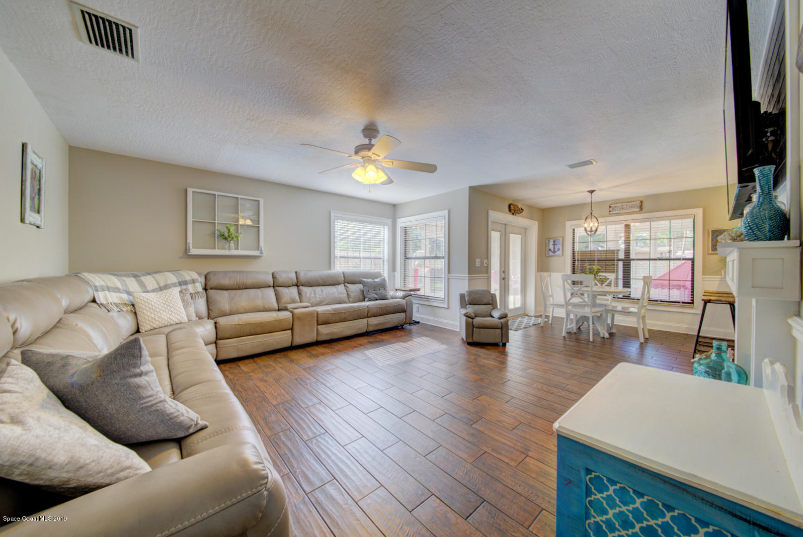 6300 Janina Road Cocoa, FL 32927 - Photo 54 of 74 family room with wood-look tile floor