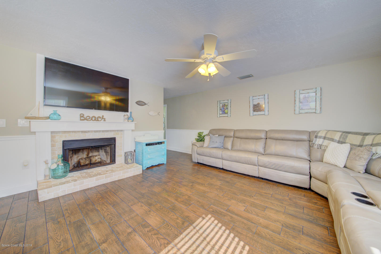 6300 Janina Road Cocoa, FL 32927 - Photo 56 of 74 family room with fireplace