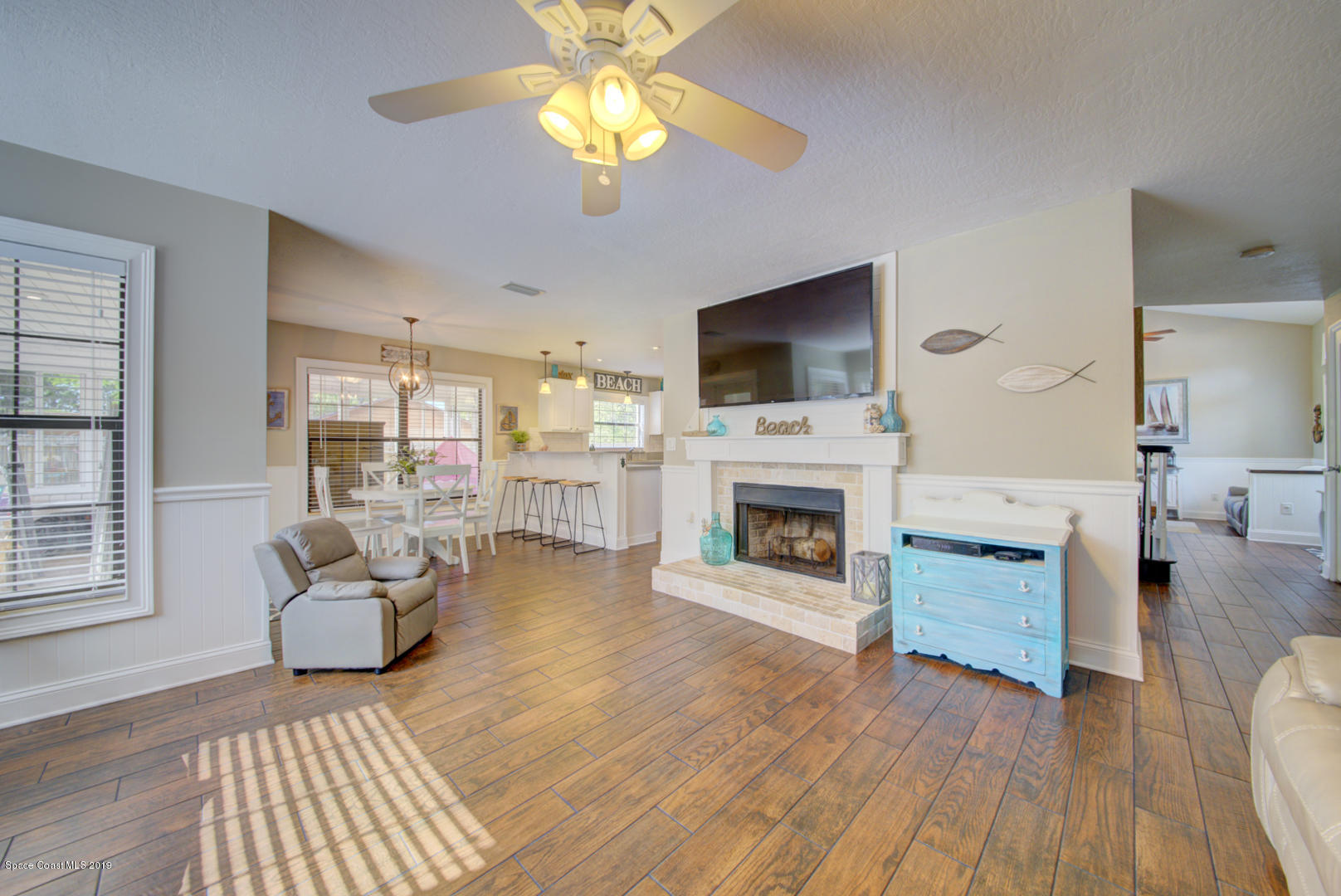 6300 Janina Road Cocoa, FL 32927 - Photo 58 of 74 family room open to breakfast nook
