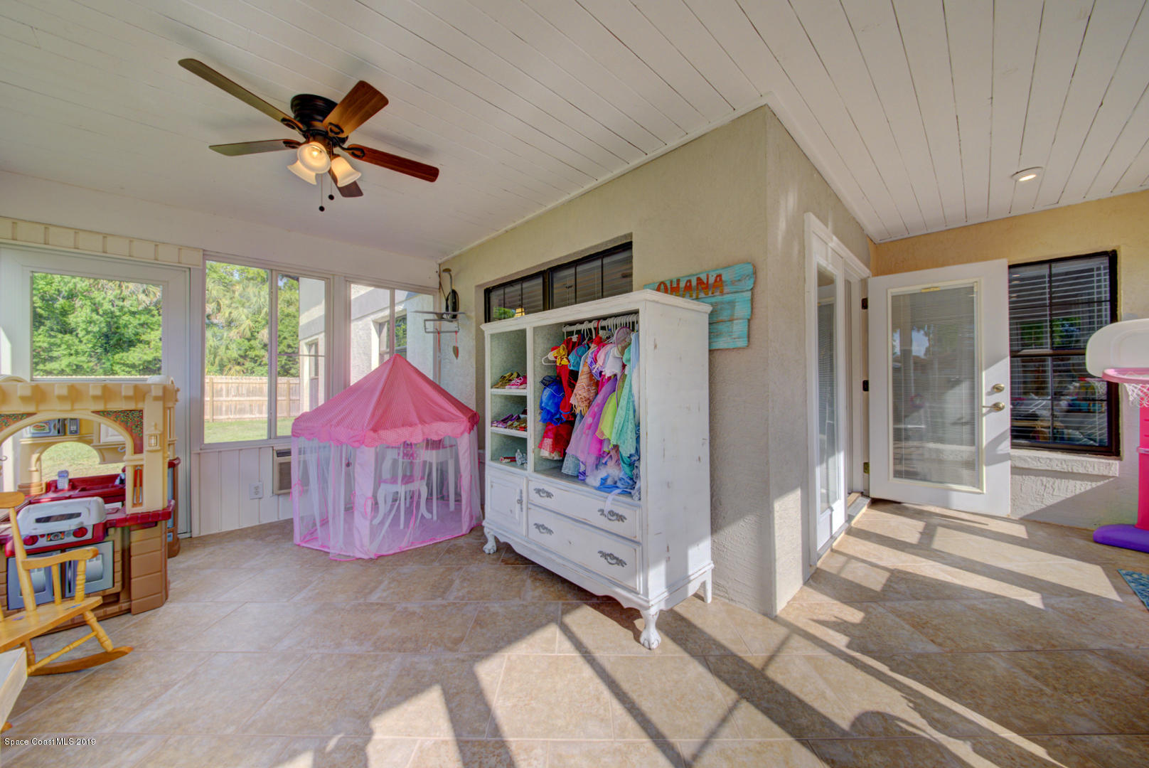 6300 Janina Road Cocoa, FL 32927 - Photo 66 of 74 back porch with tile floor