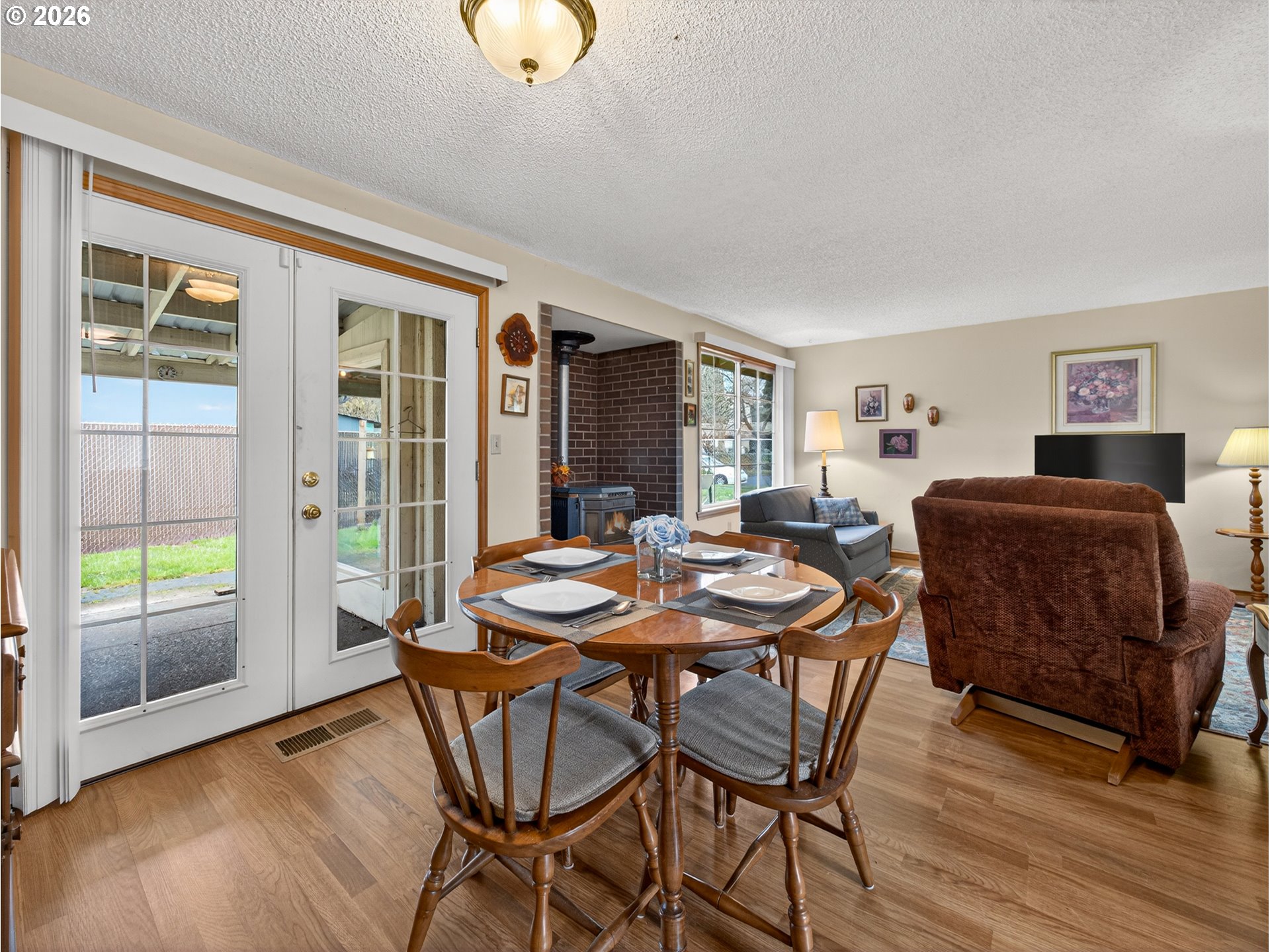 3025 Northeast 29th Street Gresham, OR 97030 - Photo 13 of 33 a view of a dining room with furniture and wooden floor