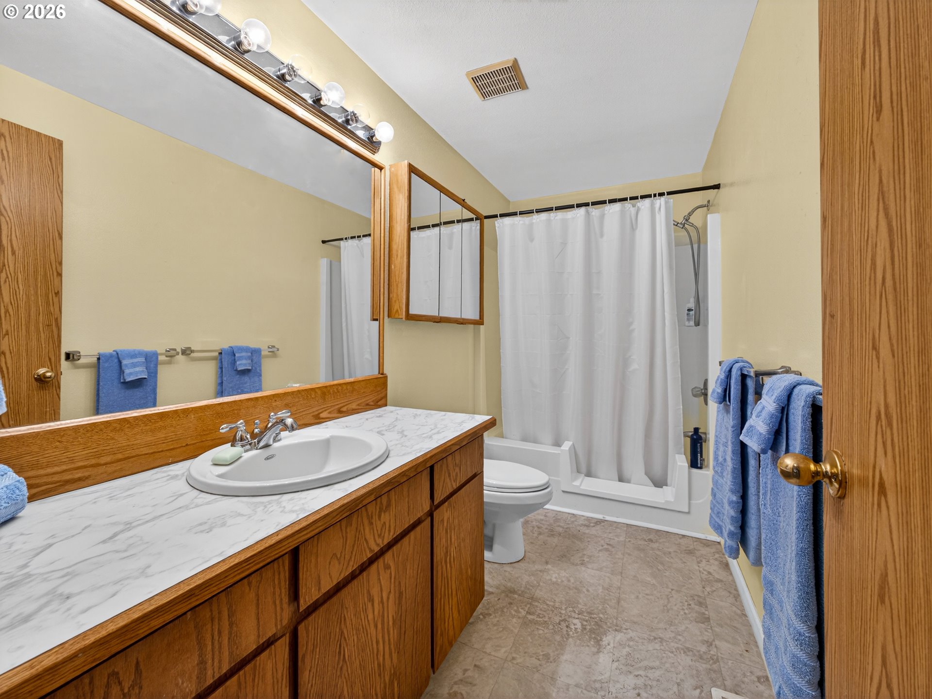 3025 Northeast 29th Street Gresham, OR 97030 - Photo 16 of 33 a bathroom with a granite countertop sink and a mirror