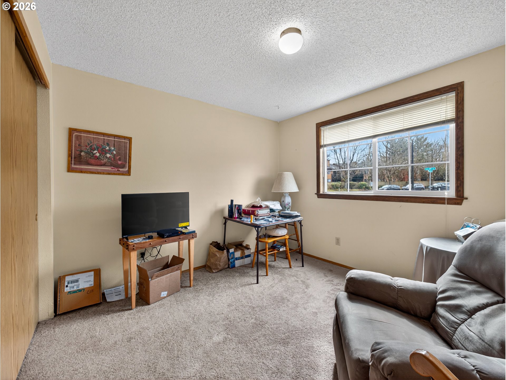 3025 Northeast 29th Street Gresham, OR 97030 - Photo 19 of 33 a living room with furniture and a flat screen tv