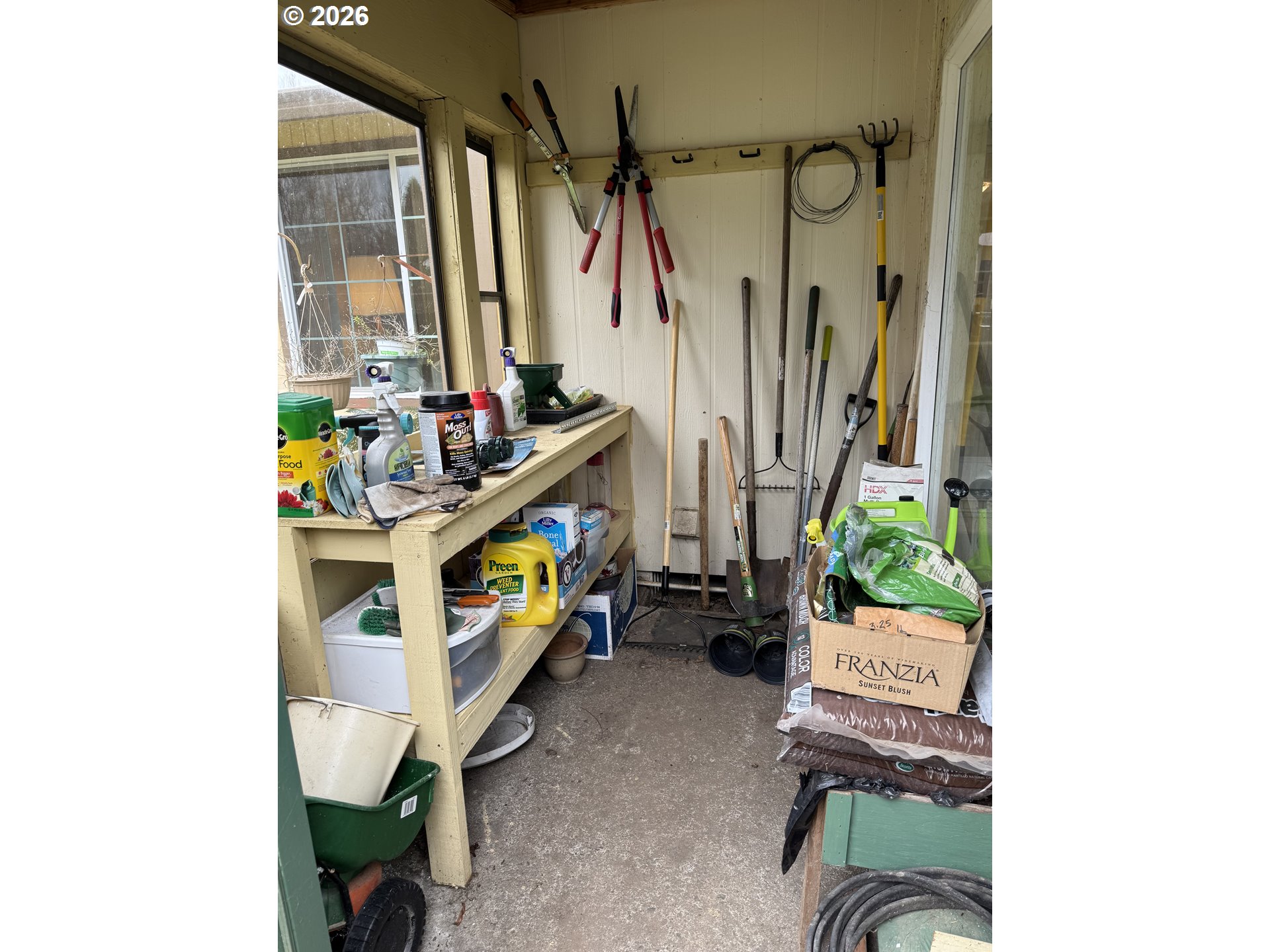 3025 Northeast 29th Street Gresham, OR 97030 - Photo 22 of 33 a living room with furniture and a flat screen tv
