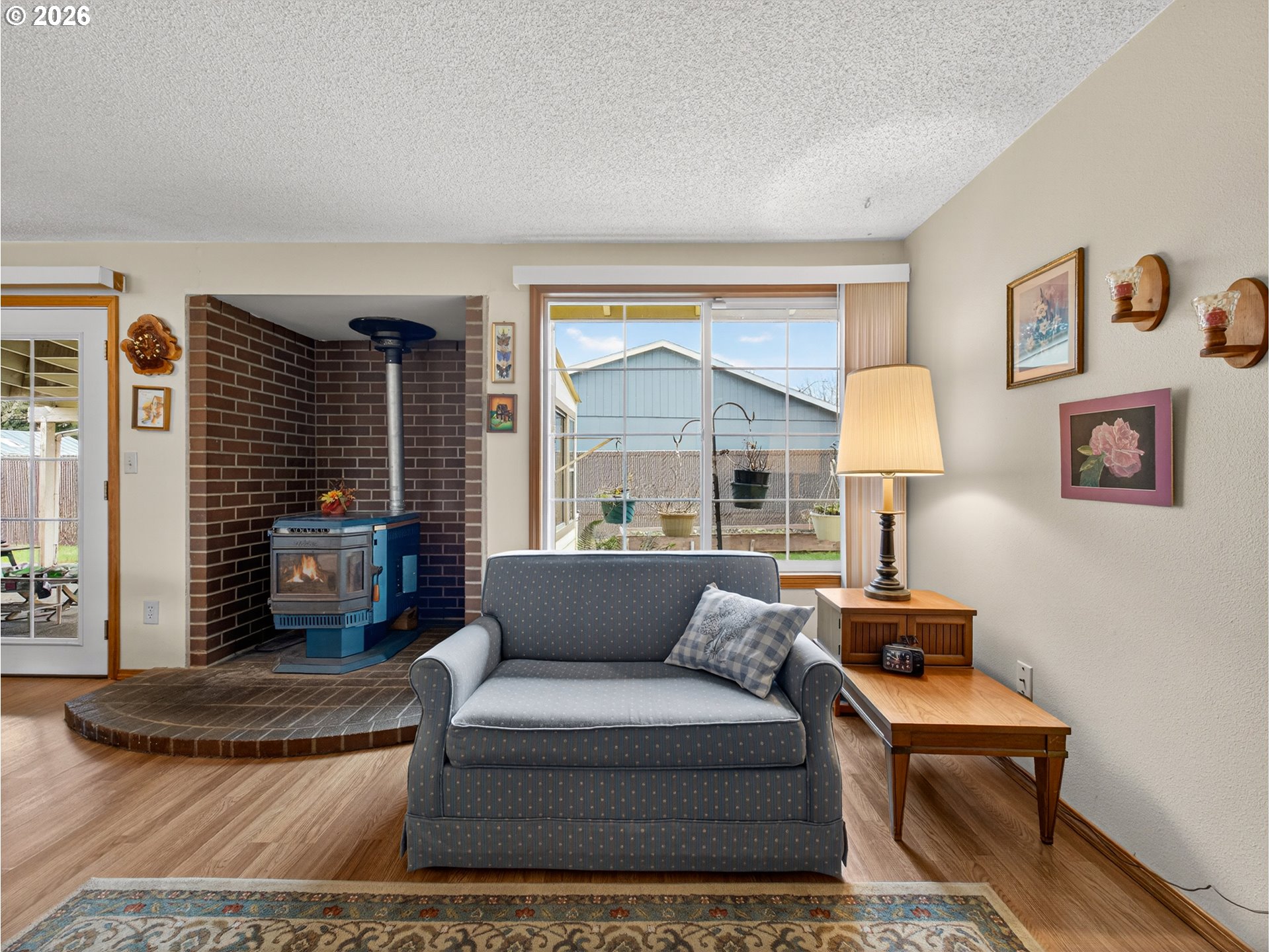 3025 Northeast 29th Street Gresham, OR 97030 - Photo 5 of 33 a living room with furniture and a large window