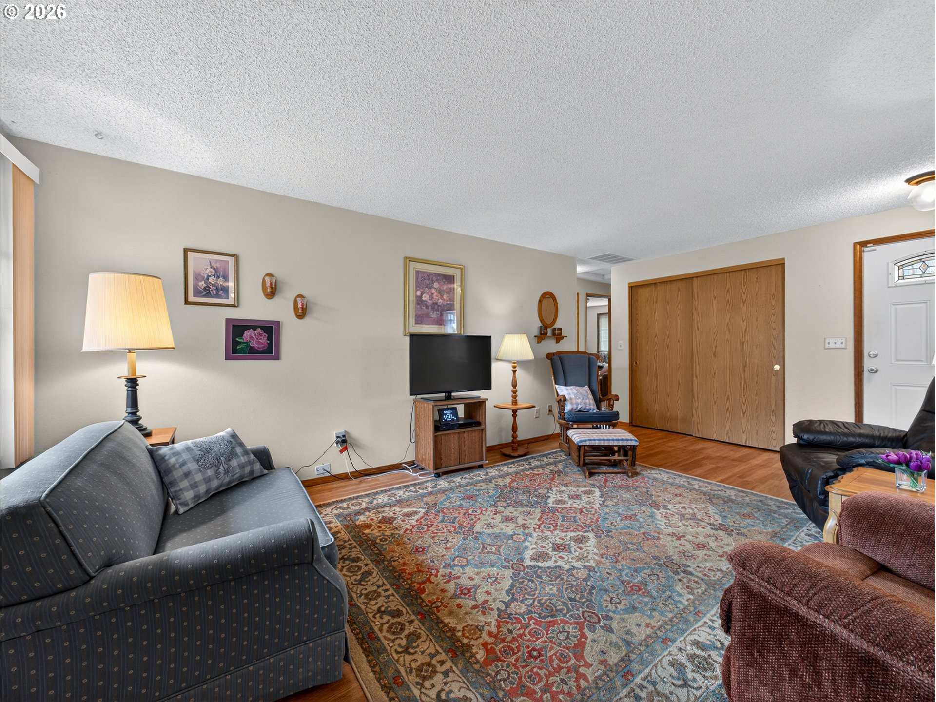 3025 Northeast 29th Street Gresham, OR 97030 - Photo 7 of 33 a living room with furniture and a lamp