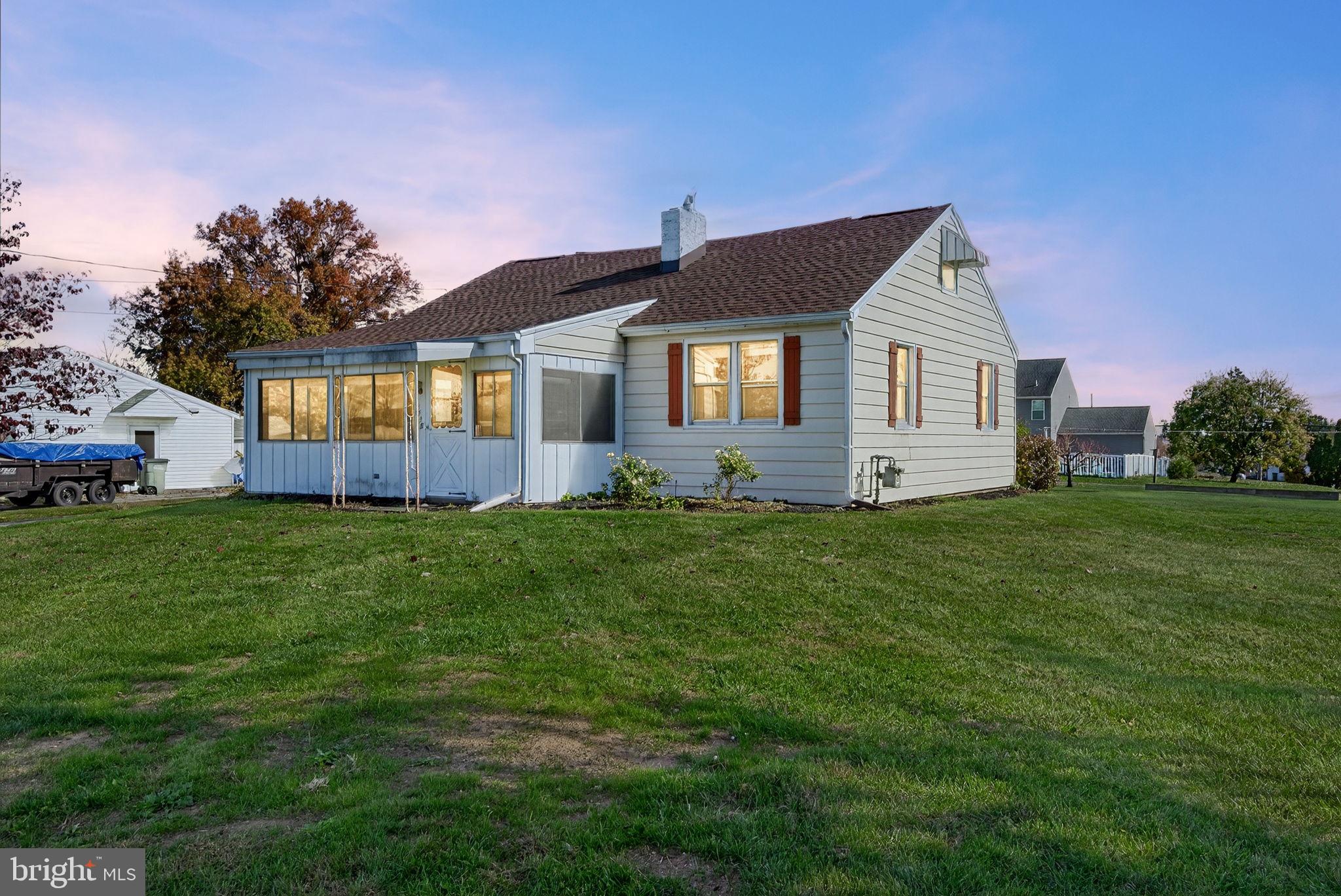 1705 Virginia Avenue Dover, PA 17315 - Photo 1 of 41 a front view of house with yard and green space