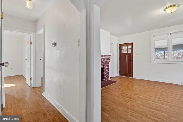 a view of entryway with wooden floor
