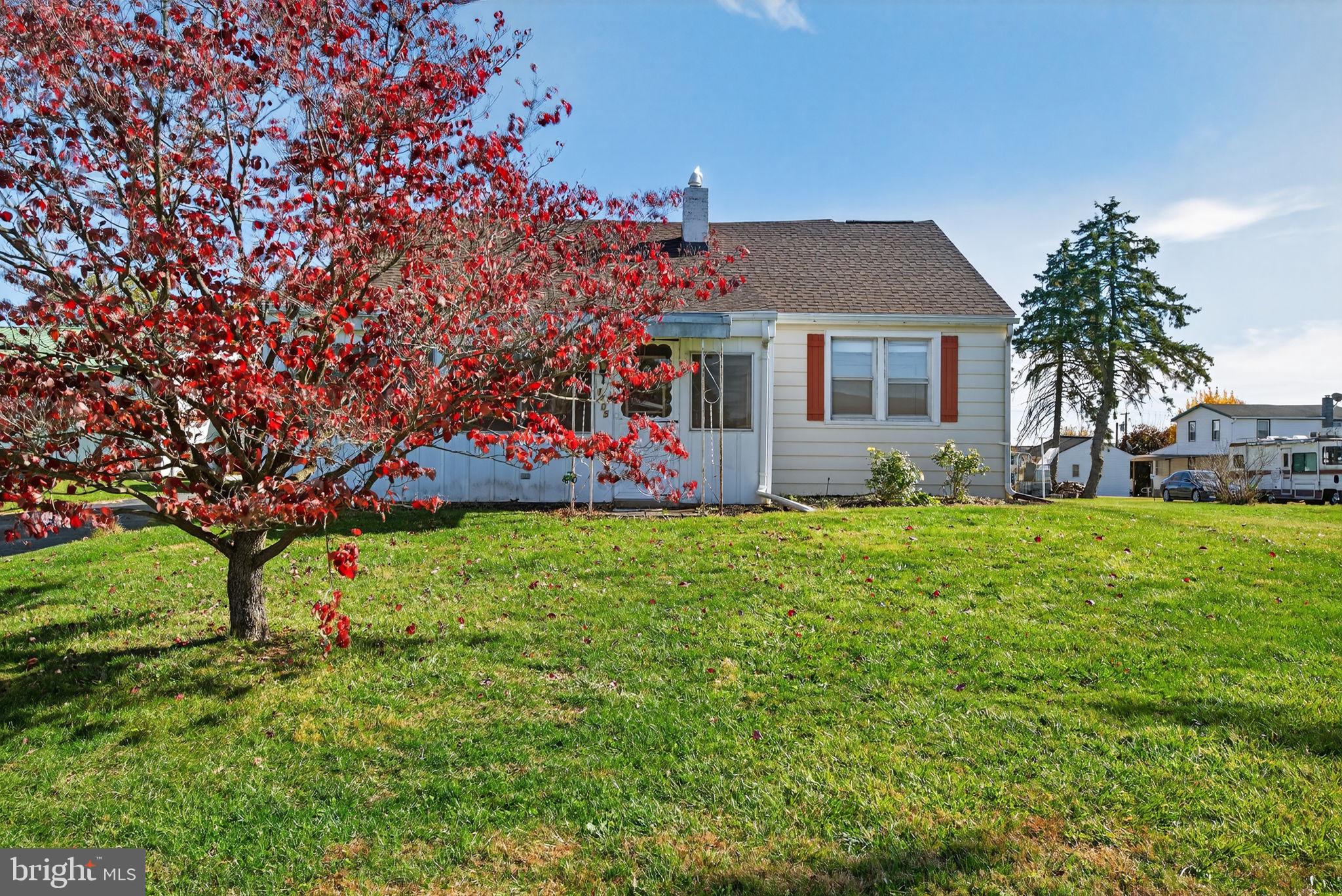 1705 Virginia Avenue Dover, PA 17315 - Photo 3 of 41 a front view of house with yard and green space