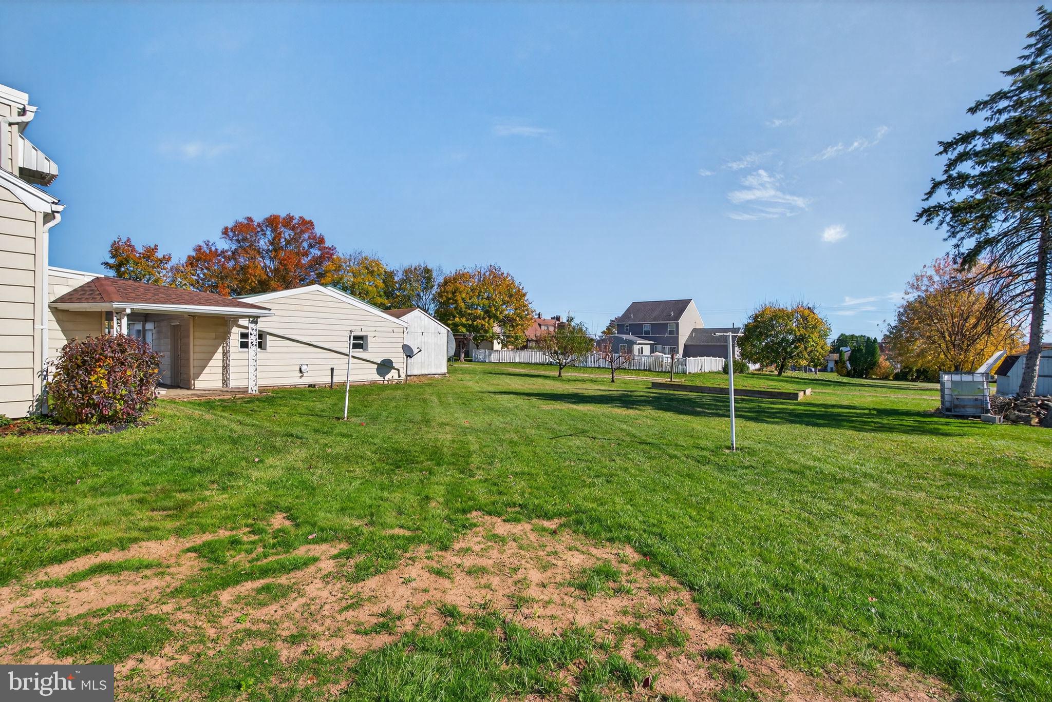1705 Virginia Avenue Dover, PA 17315 - Photo 38 of 41 a view of a backyard with a garden and entertaining space