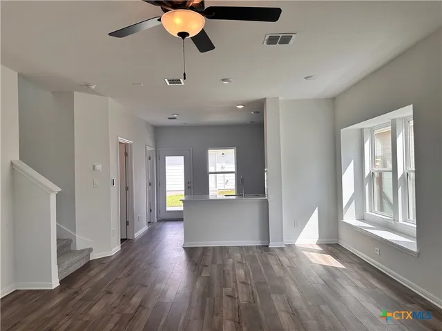 a view empty room with window and wooden floor
