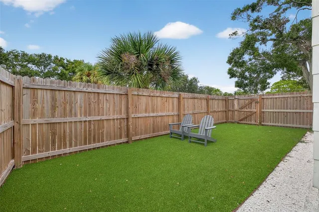 a view of a backyard with a garden