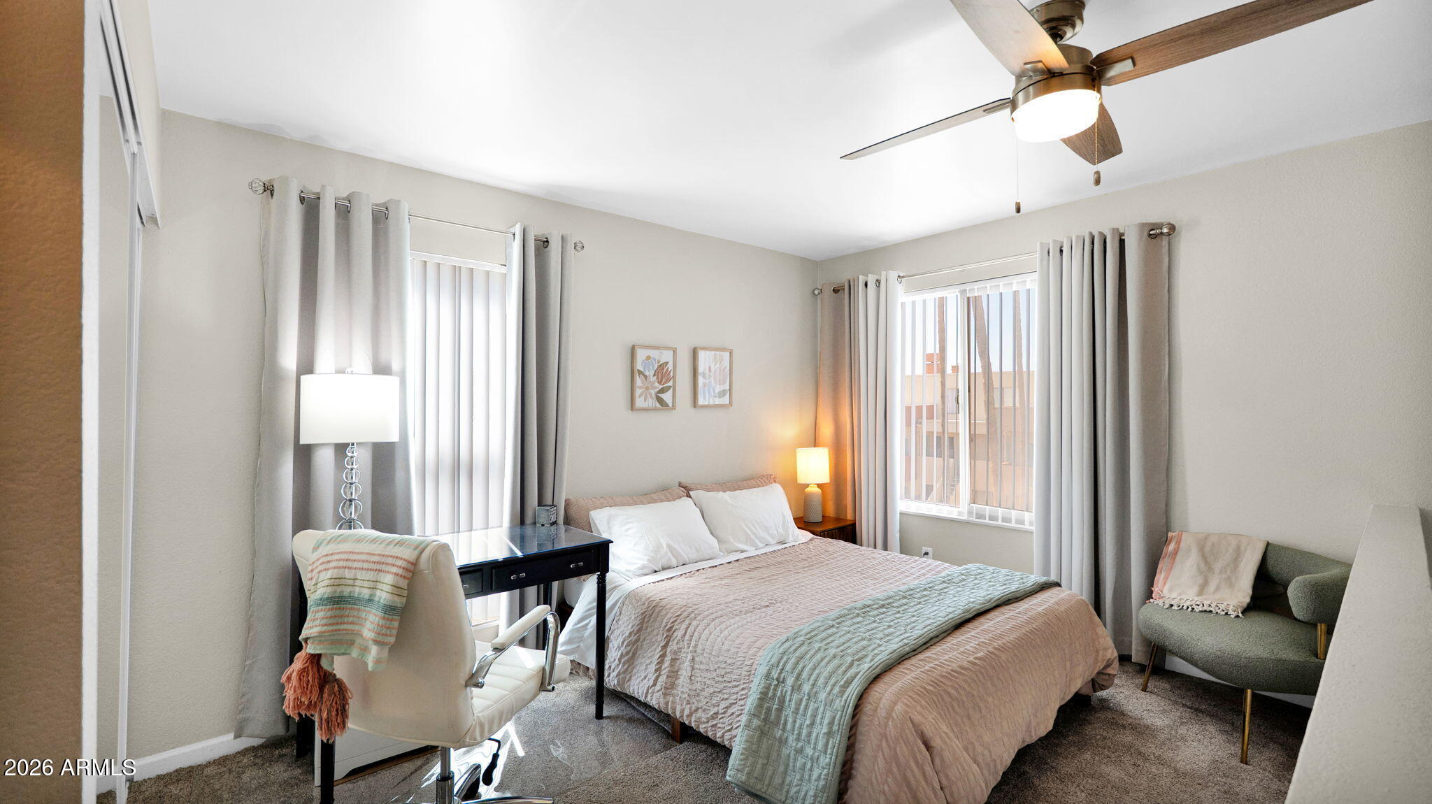 3500 North Hayden Road, Unit 1708 Scottsdale, AZ 85251 - Photo 2 of 25 a bedroom with a bed and windows
