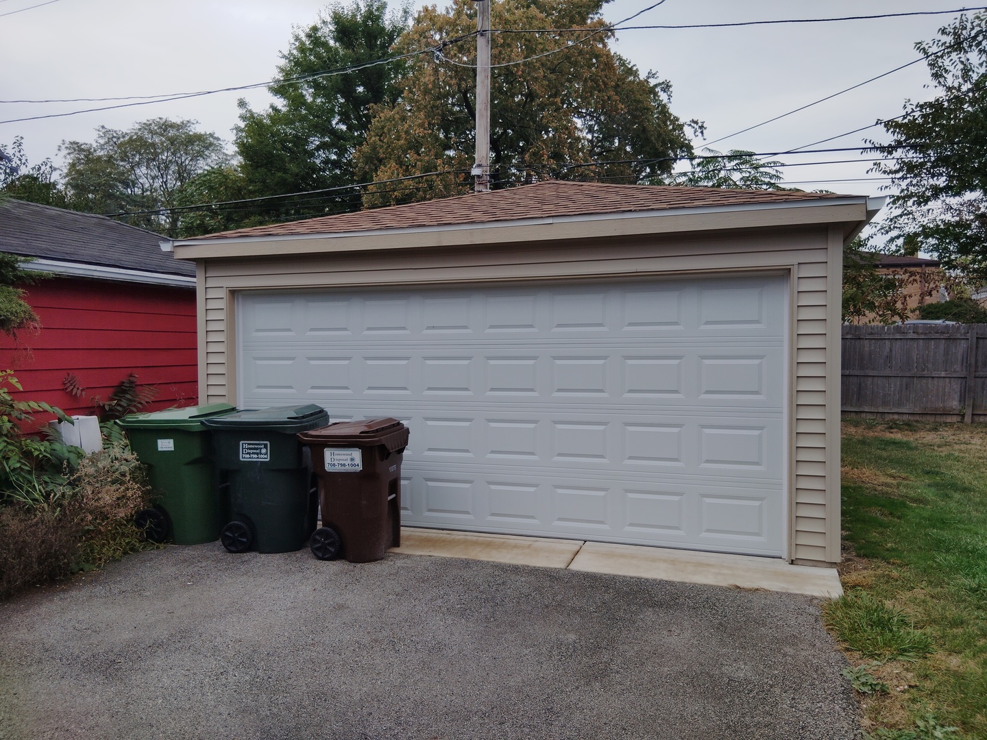 1406 Birch Road Homewood, IL 60430 - Photo 24 of 31 a front view of a house with garage