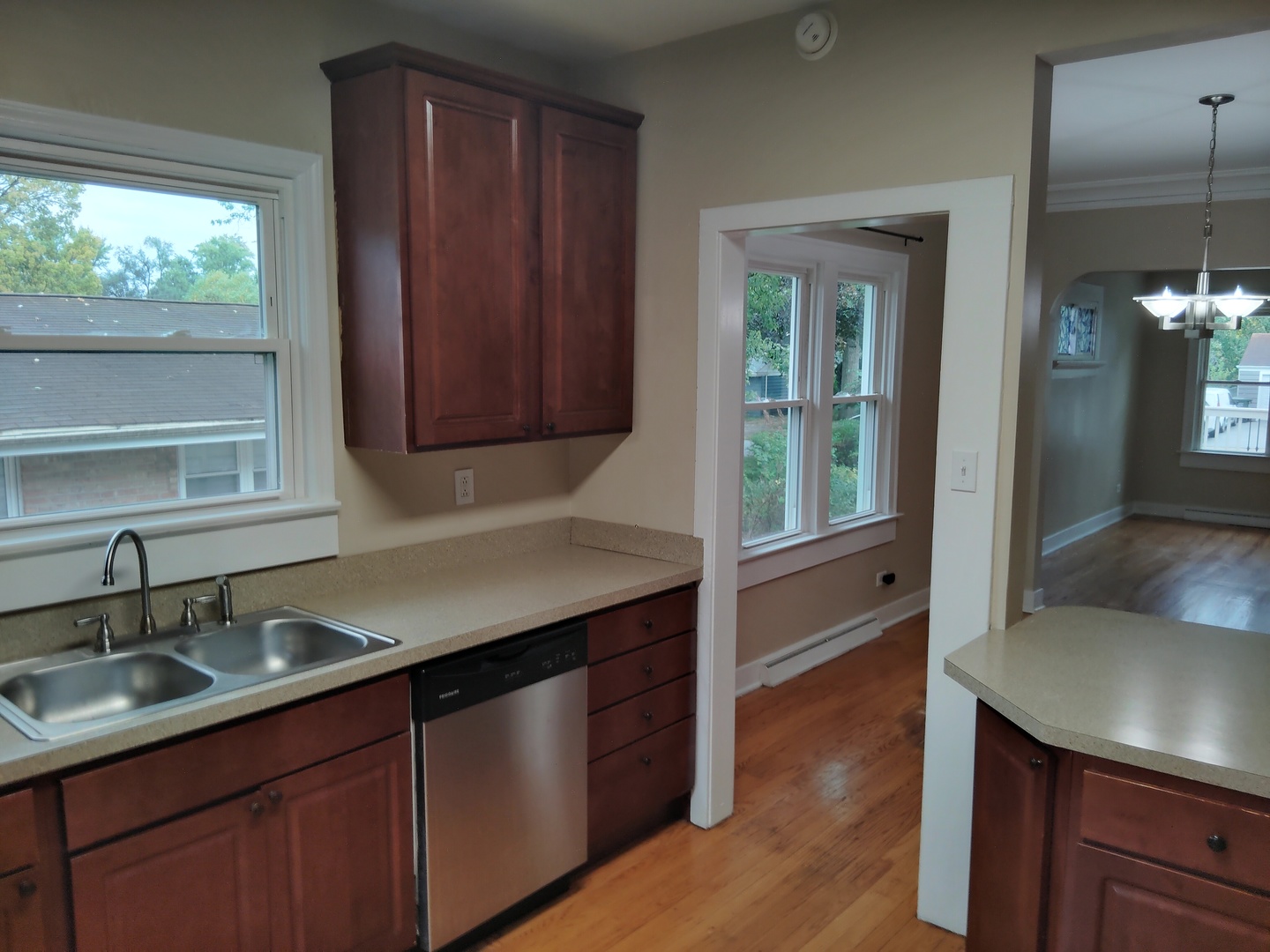 1406 Birch Road Homewood, IL 60430 - Photo 6 of 31 a kitchen with a sink cabinets and window