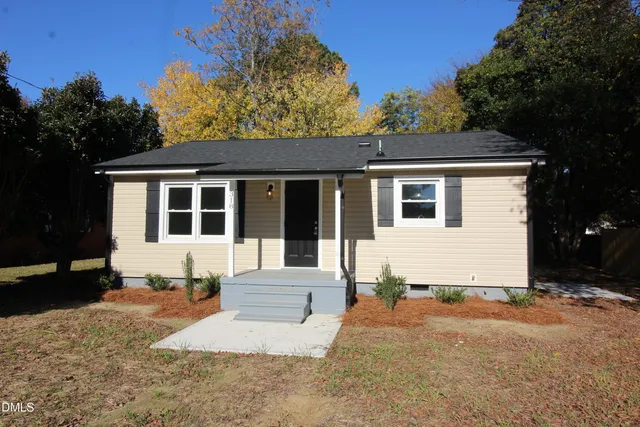 a view of a house with a patio