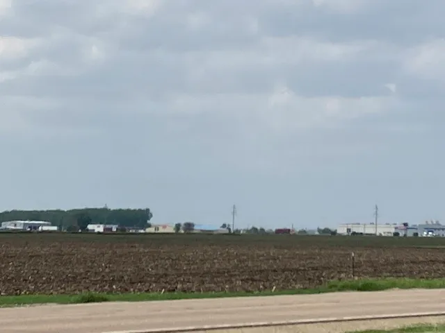 a view of a lake and a yard
