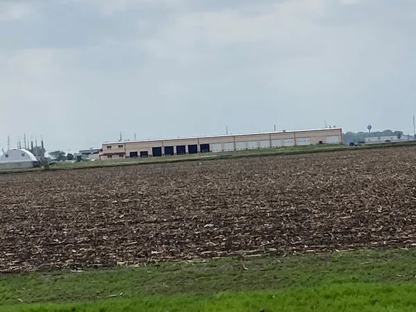 a view of a lake with a big yard